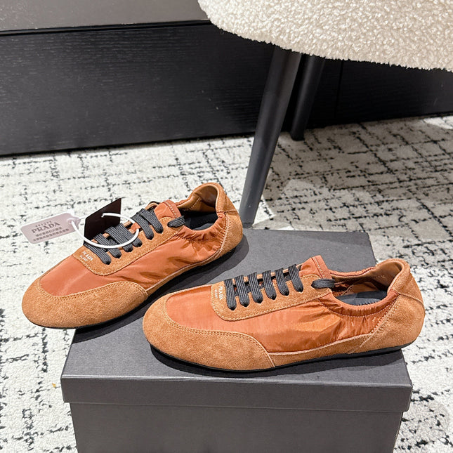 PRADA 25S COLLAPSE SNEAKERS IN BURNT ORANGE RE NYLON AND SUEDE