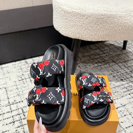 LV TWO-STRAP SLIDES 25S IN BLACK FABRIC AND CALFSKIN
