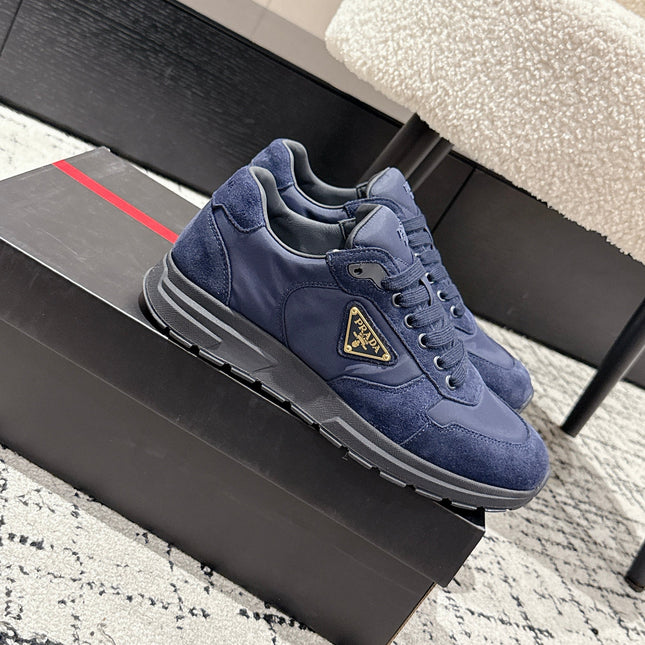 PRADA 25S MEN SNEAKERS LOGO IN NAVY BLUE NUBUCK AND CANVAS