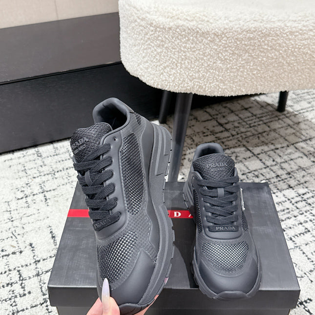 PRADA 25S MEN SNEAKERS IN BLACK CANVAS