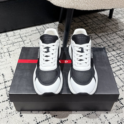 PRADA 25S MEN SNEAKERS IN BLACK AND WHITE CANVAS