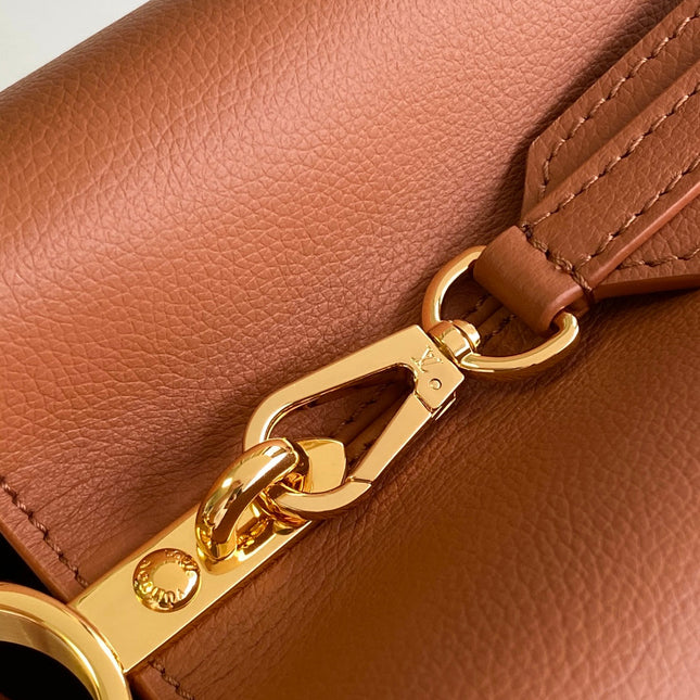 CAPUCINES 33 IN COGNAC CALFSKIN GOLD HARDWARE