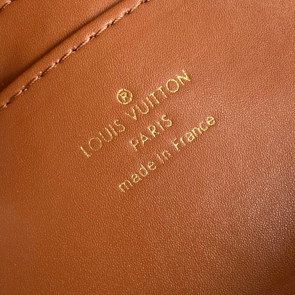 CAPUCINES 33 IN COGNAC CALFSKIN GOLD HARDWARE