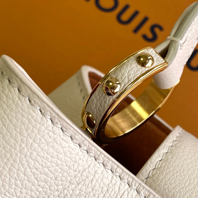 CAPUCINES 33 IN OFF WHITE CALFSKIN GOLD HARDWARE