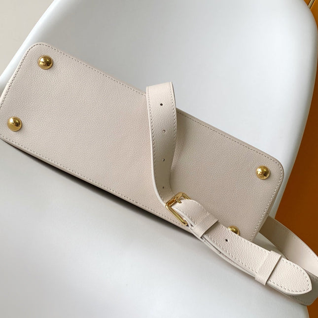CAPUCINES 33 IN OFF WHITE CALFSKIN GOLD HARDWARE