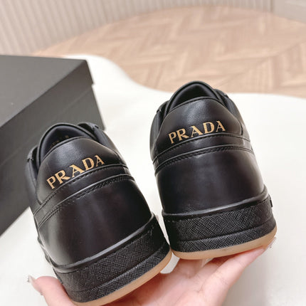 PRADA 25S DOWNTOWN SNEAKERS IN BLACK CALFSKIN