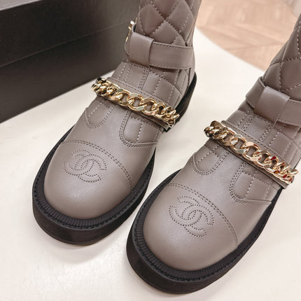 CHANEL ANKLE BOOTS 25S IN SMOKY GREY LAMBSKIN EMBOSSED LOGO WITH GOLD HARDWARE
