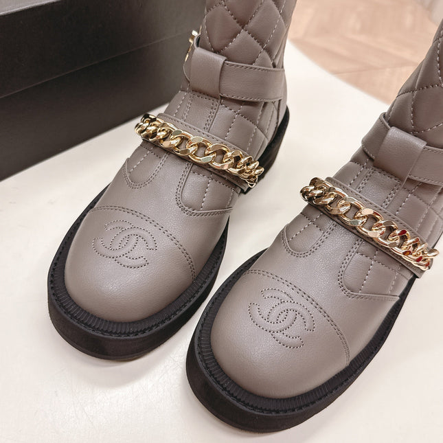 CHANEL ANKLE BOOTS 25S IN SMOKY GREY LAMBSKIN EMBOSSED LOGO WITH GOLD HARDWARE