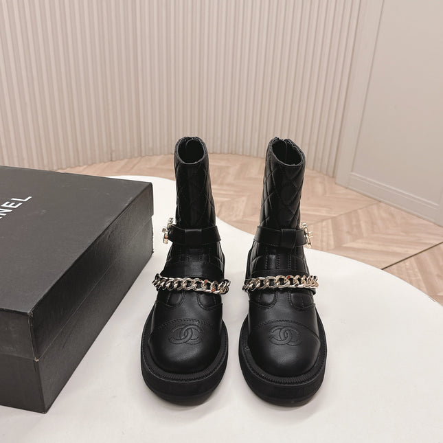 CHANEL ANKLE BOOTS 25S IN BLACK LAMBSKIN EMBOSSED LOGO WITH GOLD HARDWARE