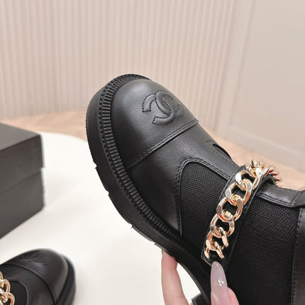 CHANEL ANKLE BOOTS 25S IN BLACK LAMBSKIN AND FABRIC WITH GOLD HARDWARE