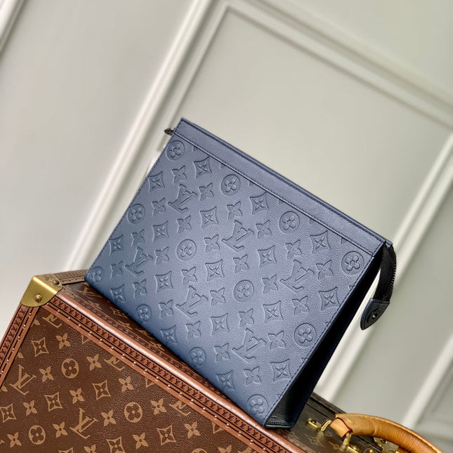 POCHETTE VOYAGE 27 IN DARK BLUE MONOGRAM ECLIPSE CALFSKIN EMBOSSED LOGO
