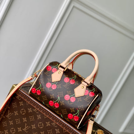 SPEEDY BANDOULIÈRE 20.5 BAG IN BROWN CANVAS CHERRY PRINTED