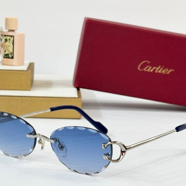 C DE RIMLESS ROUND FRAME SUNGLASSES CT0599S IN METAL