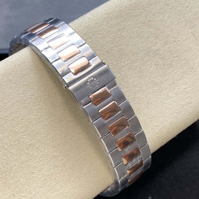 NAUTILUS STEEL AND ROSE GOLD BRACELET BLUE DIAL