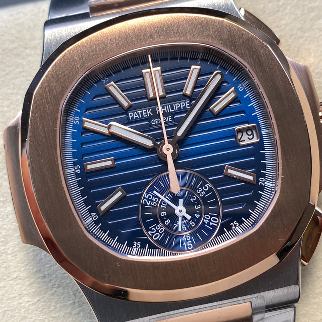 NAUTILUS STEEL AND ROSE GOLD BRACELET BLUE DIAL