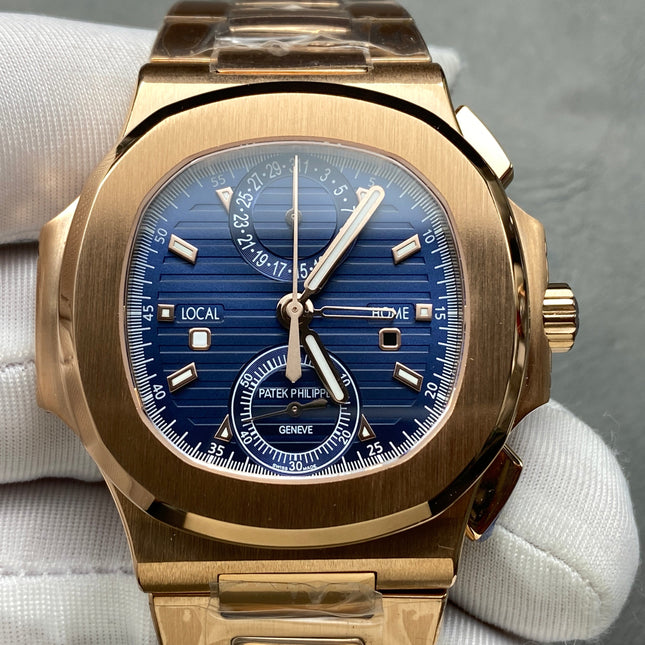 NAUTILUS TRAVEL TIME ROSE GOLD CASE SUNBURST BLUE DIAL