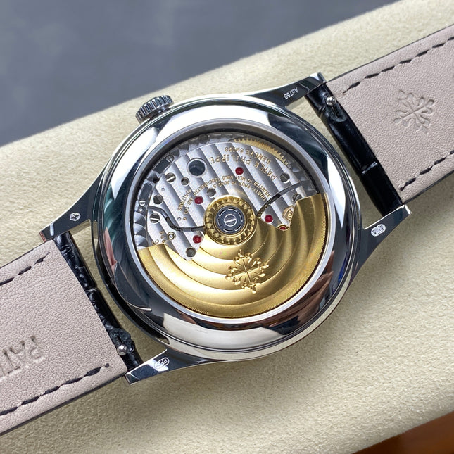 ANNUAL CALENDAR SELF-WINDING WHITE GOLD CASE BROWN BLACK STRAP