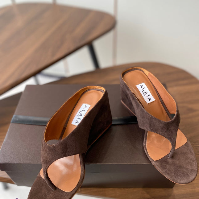 ALAIA WEDGE THONG SANDALS 25S IN BROWN SUEDE