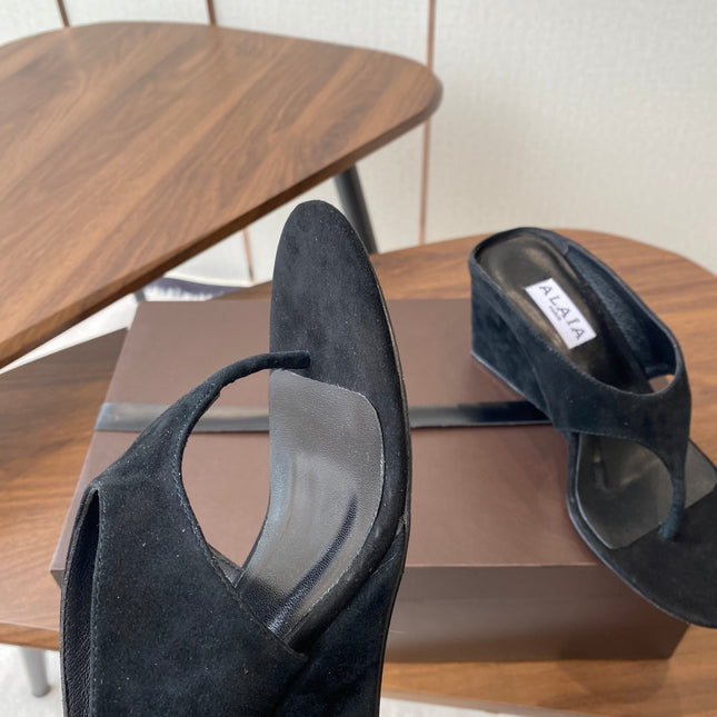 ALAIA WEDGE THONG SANDALS 25S IN BLACK SUEDE