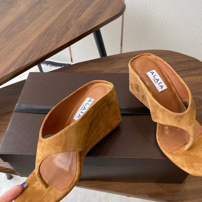 ALAIA WEDGE THONG SANDALS 25S IN BURNT ORANGE SUEDE