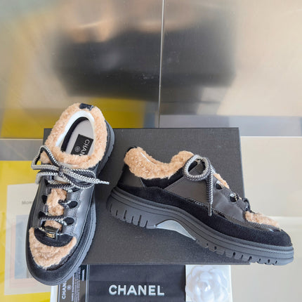 CHANEL 25S SNEAKERS WITH FUR ACCENTS 40MM IN BLACK AND BROWN CALFSKIN