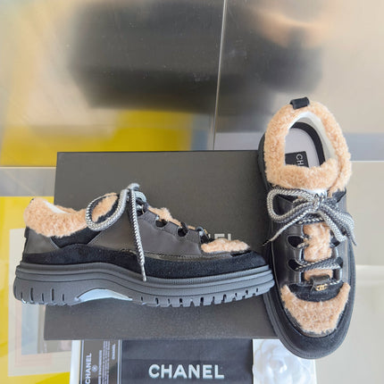 CHANEL 25S SNEAKERS WITH FUR ACCENTS 40MM IN BLACK AND BROWN CALFSKIN