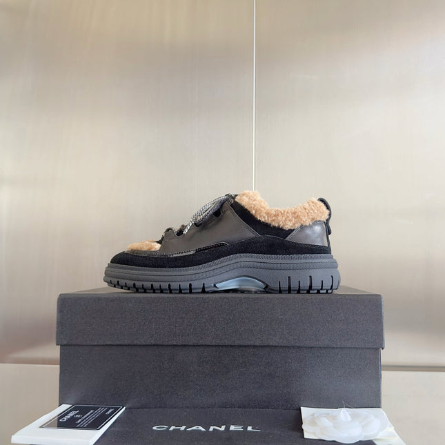 CHANEL 25S SNEAKERS WITH FUR ACCENTS 40MM IN BLACK AND BROWN CALFSKIN