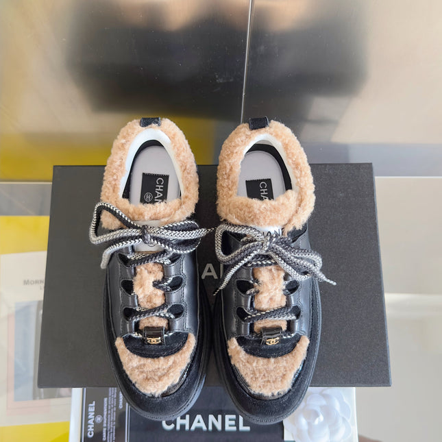 CHANEL 25S SNEAKERS WITH FUR ACCENTS 40MM IN BLACK AND BROWN CALFSKIN