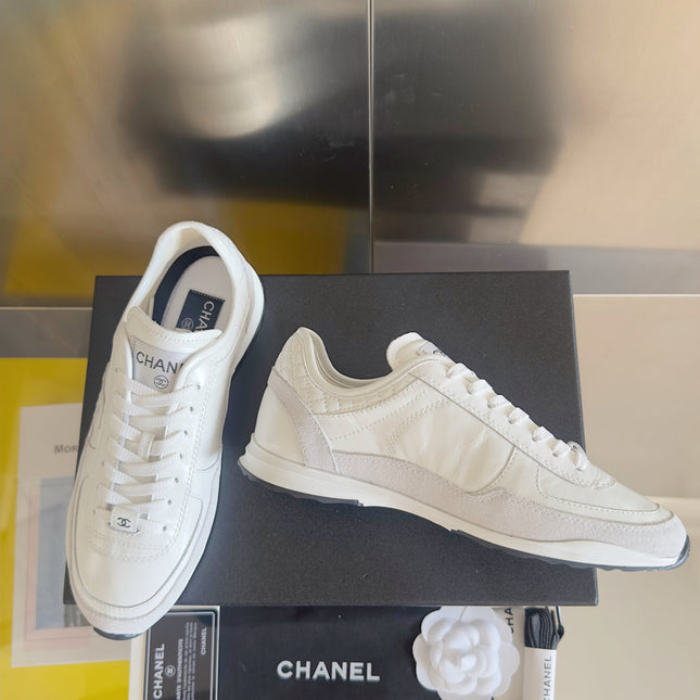 CHANEL 25S SNEAKERS 20MM IN WHITE CALFSKIN