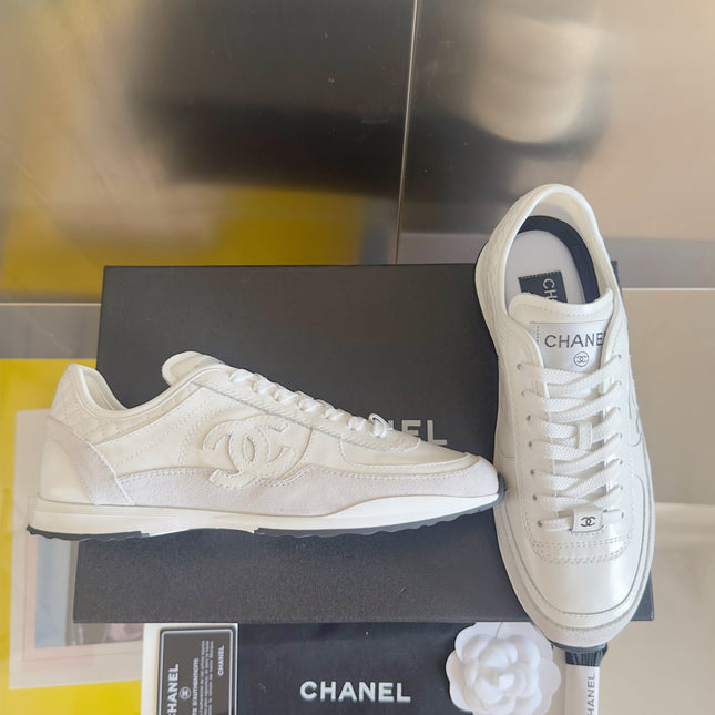 CHANEL 25S SNEAKERS 20MM IN WHITE CALFSKIN