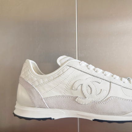 CHANEL 25S SNEAKERS 20MM IN WHITE CALFSKIN