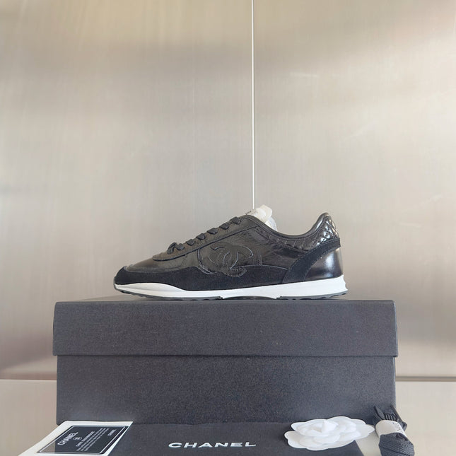 CHANEL 25S SNEAKERS 20MM IN BLACK GLOSSY CALFSKIN