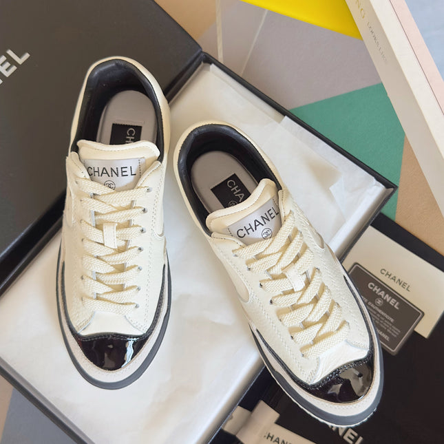 CHANEL 25S SNEAKERS WITH PATENT TOE 20MM IN WHITE CALFSKIN