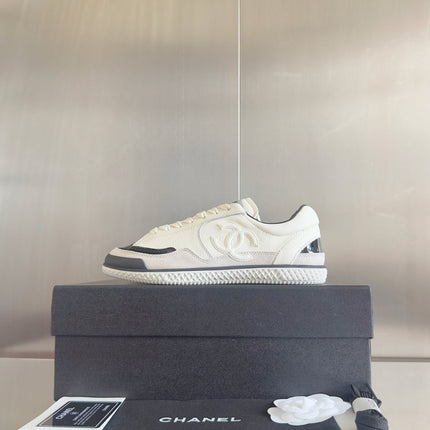 CHANEL 25S SNEAKERS WITH PATENT TOE 20MM IN WHITE CALFSKIN