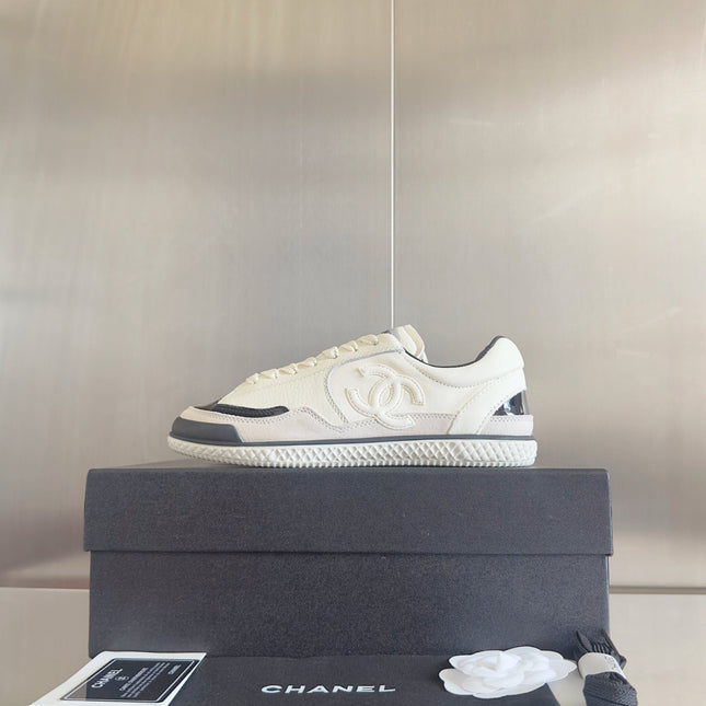 CHANEL 25S SNEAKERS WITH PATENT TOE 20MM IN WHITE CALFSKIN