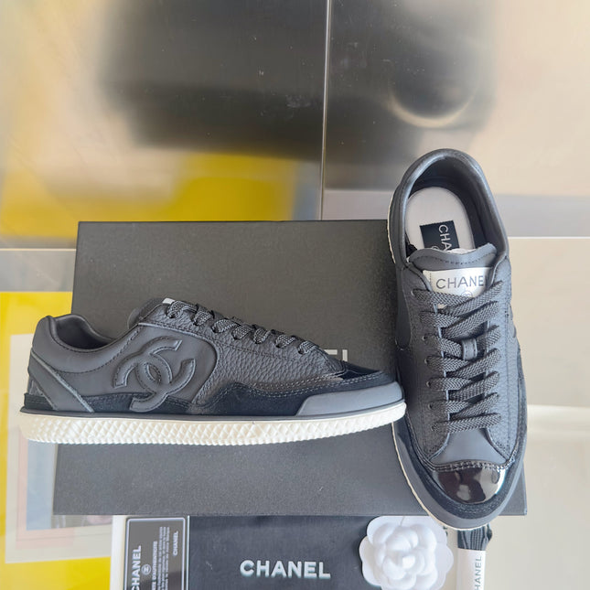 CHANEL 25S SNEAKERS WITH PATENT TOE 20MM IN BLACK CALFSKIN