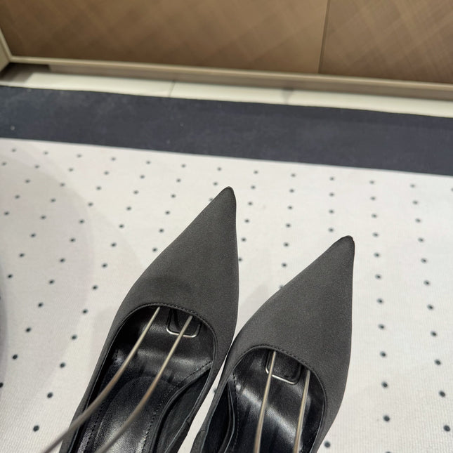 L'ENTRACTE SLINGBACK PUMPS IN BLACK SATIN