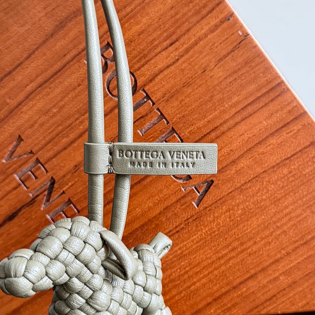 BOTTEGA VENETA 25S DOG CHARM IN GREIGE CALFSKIN
