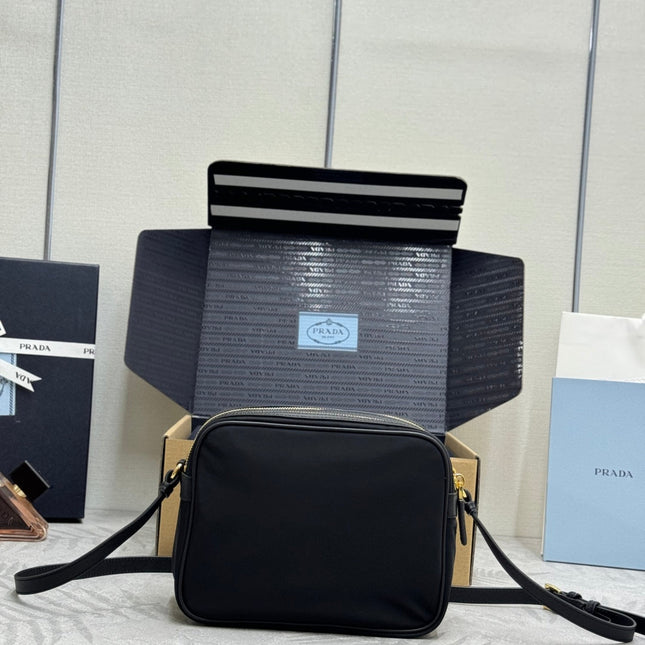 PRADA 25S RE-EDITION 1978 MINI 21 IN BLACK NYLON AND SAFFIANO CALFSKIN