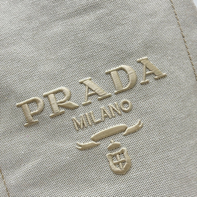 PRADA 25S DRAWSTRING BACKPACK 55 IN BEIGE CANVAS LINEN SILVER HARDWRE