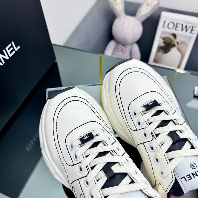 TRAINERS SNEAKER IN WHITE CALFSKIN WITH BLACK EMBROIDERED