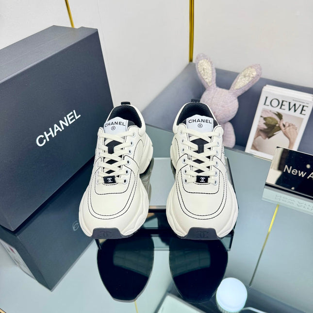 TRAINERS SNEAKER IN WHITE CALFSKIN WITH BLACK EMBROIDERED