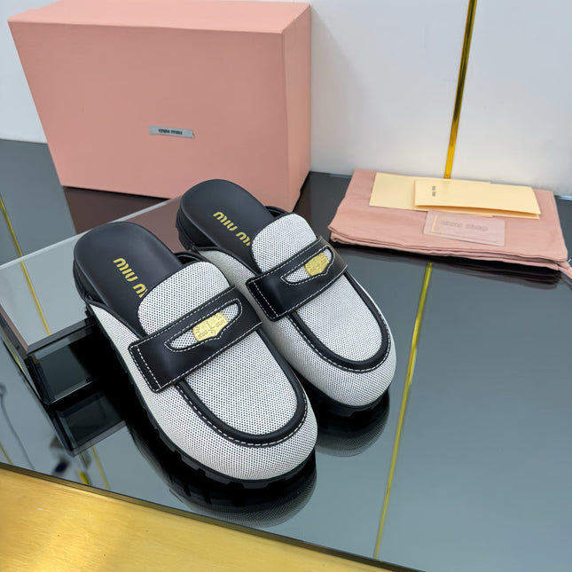 MULES SLIPPERS IN BLACK CALFSKIN AND WHITE DOTS CANVAS WITH GOLD COIN