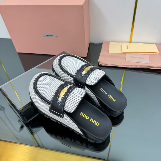 MULES SLIPPERS IN BLACK CALFSKIN AND WHITE DOTS CANVAS WITH GOLD COIN