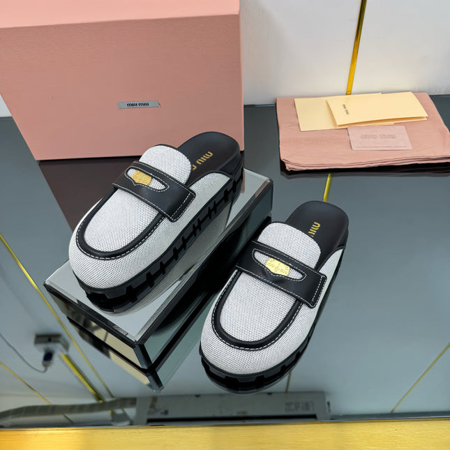 MULES SLIPPERS IN BLACK CALFSKIN AND WHITE DOTS CANVAS WITH GOLD COIN