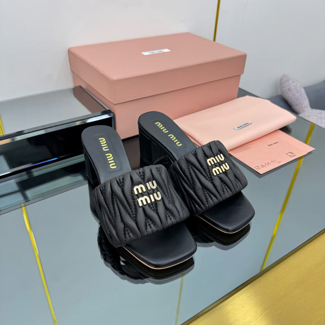 MATELASSÉ SLIDES PUMP IN BLACK CALFSKIN