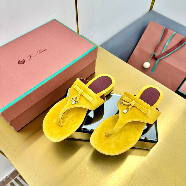 FLIP FLOPS IN YELLOW SUEDE AND HARDWARE SILVER