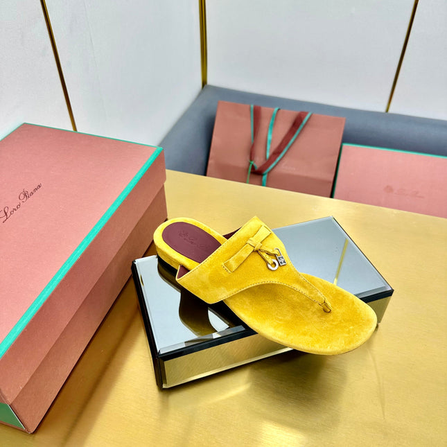 FLIP FLOPS IN YELLOW SUEDE AND HARDWARE SILVER