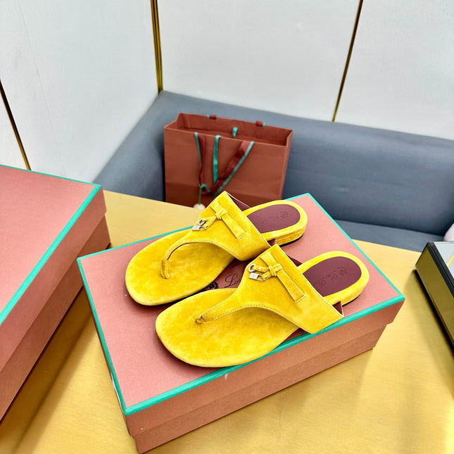 FLIP FLOPS IN YELLOW SUEDE AND HARDWARE SILVER