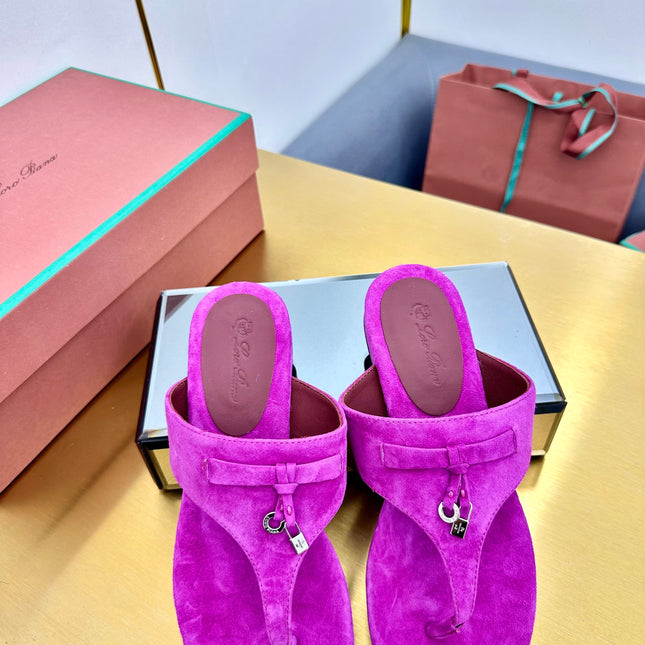 FLIP FLOPS IN NEON PINK SUEDE AND HARDWARE SILVER